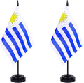 WXTWK 2 Pack Uruguay Flag Uruguay Deluxe Desk Flag Set - Mini Small Uruguayan Table Office Flags with Black 12" Solid Pole Stand Base Classroom Meeting Desktop Decorations