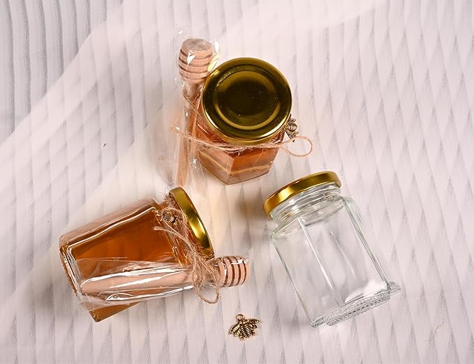 Adabocute 4oz Hexagonal Honey Jars - Glass Honey Jars with Gold Lids, Wooden Dippers, Bee Charms and Jutes - Hexagon Jars for Baby Shower, Wedding and Party Favors, 12 Pack