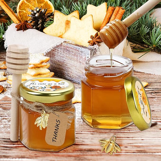 Aliggbent 48 Pack Mini Honey Jars Party Favors in Bulk, 1.5 oz Small Hexagon Glass Honey Jars with Dippers, Lids, Cute Stickers, Bee Charms, Gift Bags and Jute for Baby Showers, Weddings & Birthdays